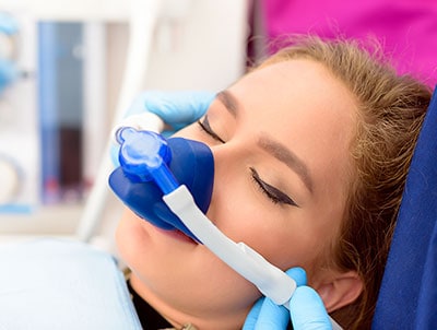 Patient being sedated with nitrous oxide